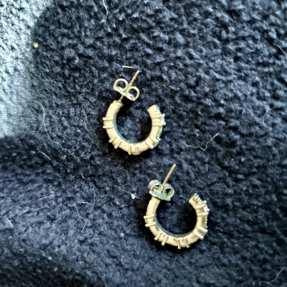 Silver looped earrings.